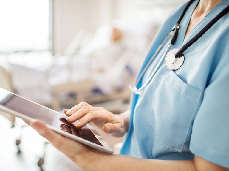 Nurse holding tablet